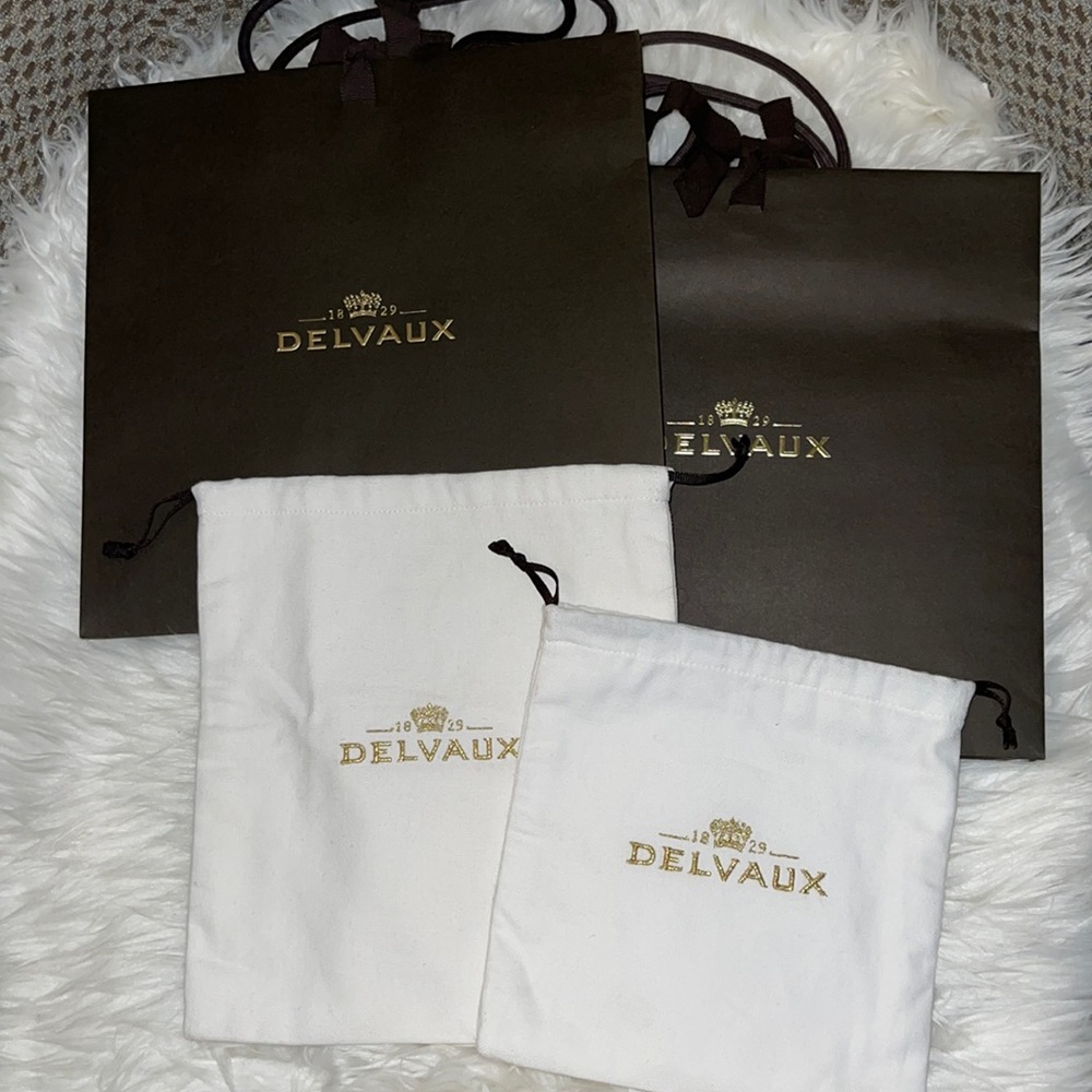 Delvaux one shopping bags and 2 small dustbags